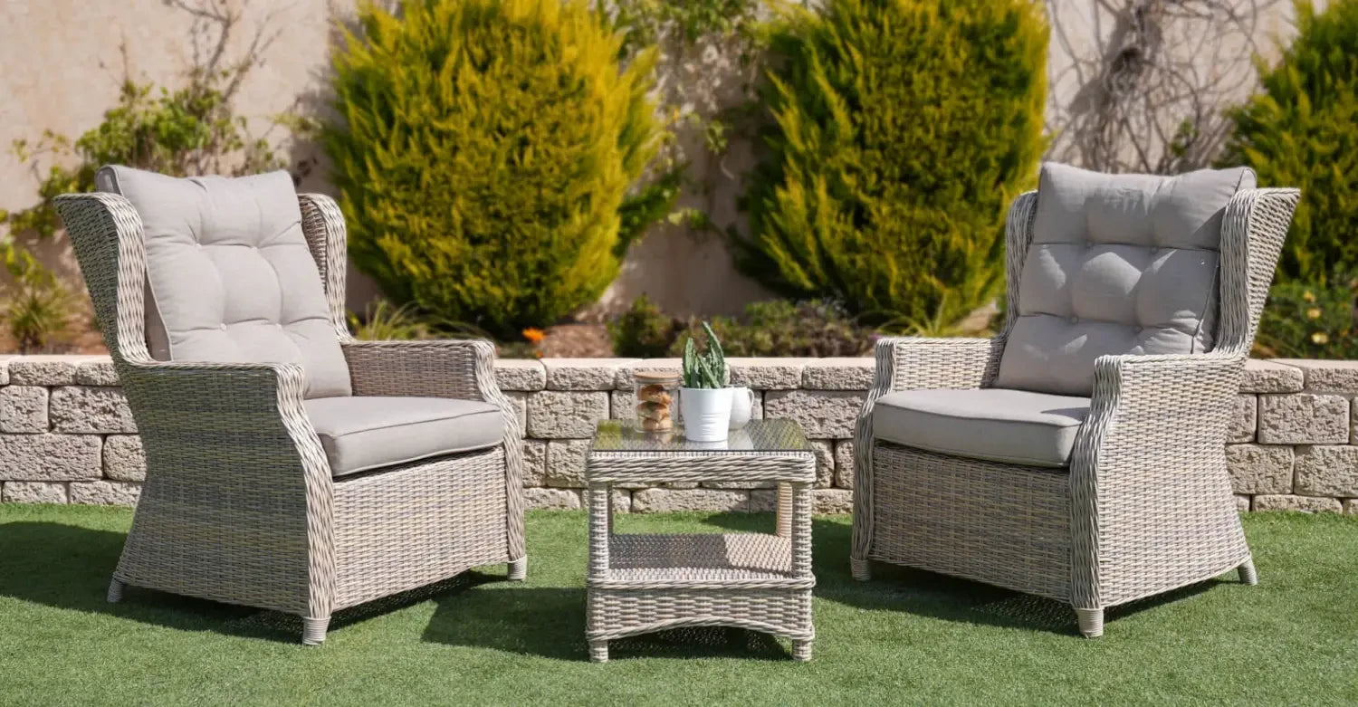 Nardi outdoor furniture set featuring wicker armchairs and a small table for patio.