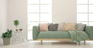 White living room with soft green sofa. Scandinavian interior design. 3D illustration