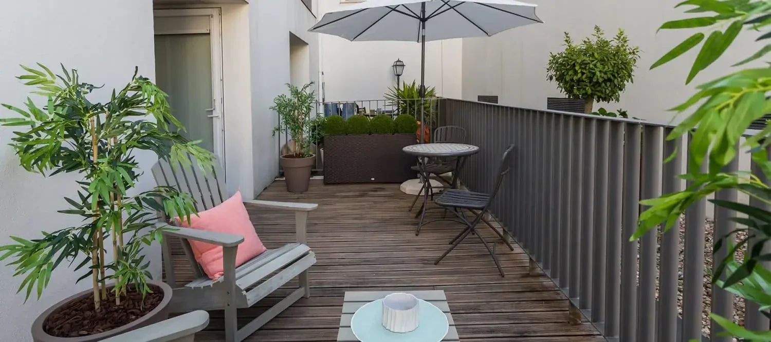 Wooden deck balcony with outdoor furniture for a perfect functional outdoor space.