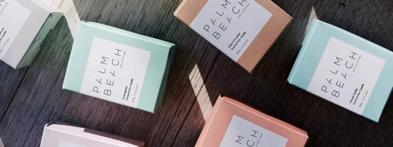 Pastel boxes labeled PLUM BEACH from the Palm Beach Collection, featuring a fragrance diffuser.