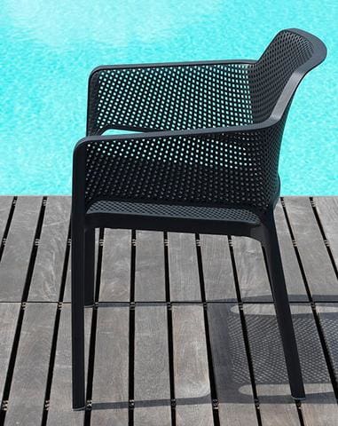 a wooden bench sitting in a chair