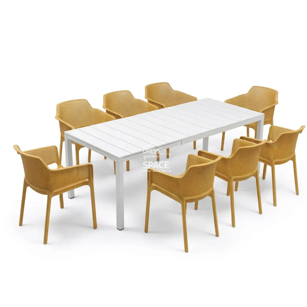 Outdoor dining setting with the table changed to white and the mustard chairs retained